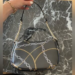 Hardbag with chain detailing